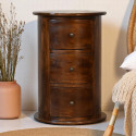 Raffinata cassettiera rotonda in legno massello di mango con finitura castagno, tre cassetti integrati e piano d’appoggio.